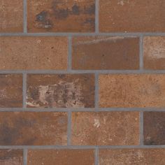 a brick wall that has been painted brown