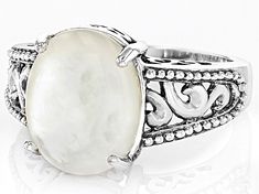 13.5x11mm Oval Cabochon Mother-Of-Pearl Sterling Silver Solitaire Ring. Measures Approximately 0.92"L x 0.54"W. Not sizeable. Oxidized. Oval Cabochon, Solitaire Ring, Mother Of Pearl, Sterling Silver, Ring, Silver