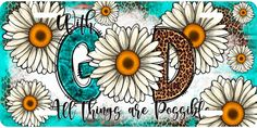 the letter d is surrounded by daisies on a blue background with white and yellow flowers