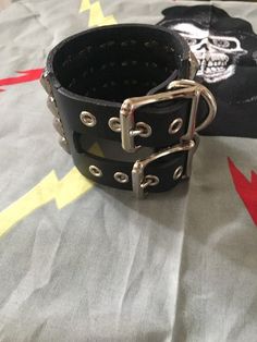 Four row studded punk bracelet on black leather and has two buckles Studded Bracelet, Boot Straps, Leather Cuffs, Philadelphia Pa, High Quality Leather, Biker Boot, Pyramid, Real Leather, Wrap Bracelet