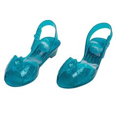 a pair of children's blue shoes with bows on the toes and heel straps