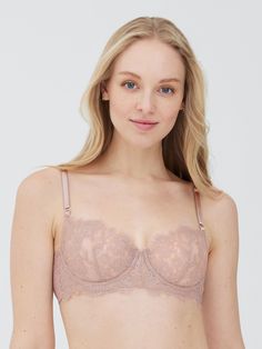 Fit Tip: Non-stretch lace. For fuller breasts, consider going up a cup in size. The Entice bra is delicate and light enough to make it the perfect sexy sheer bra. With just a hint of show through and an unlined balconette shape, this bra is sure to be a Skarlett Blue favorite in your lingerie wardrobe. The sexiest bra you'll find online. Unlined, underwire with balconette lace cups. Eyelash scalloped edge trims neckline. Brushed elastic at underarm for containment. Soft fabric backs for smooth l Feminine Pink Low-cut Bra, Bridal Lingerie Honeymoon, Pink Partially Lined Lace Bra, Luxury Balconette Intimates, Bra Friendly, Pink Lace Feminine Bra, Garter Belt Lingerie, Luxury Balconette Bra-friendly Intimates, Honeymoon Lingerie, Sheer Bra