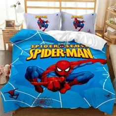 a bed with spider man on it in a bedroom