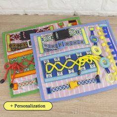 an assortment of colorful bracelets are displayed on a table