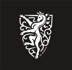 a white horse on a black background with an ornate design in the shape of a shield