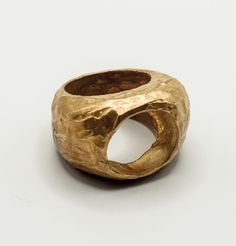 -High-Quality Solid Bronze Ring -Aesthetic Dome Ring with a hole -Textured  -Striking Statement Ring -Handmade  -Carved out of wax -Designed for women and men -This exquisite piece is also available in sterling silver Domed bronze ring without hole: https://www.etsy.com/listing/1411946708/dome-ring-large-bronze-ring-chunky-ring?click_key=2c51ebdecd0ef4a113f41fec90aeb0ae07b1d494%3A1411946708&click_sum=c73c5097&ref=shop_home_active_12&frs=1 -Explore our comprehensive selection of bronze rings:  ht Bronze Rings Women, Hand Cast Open Dome Ring Gift, Gift Dome Ring Hand Cast Open Design, Hand Cast Wide Band Ring Gift, Unique Open Ring In Bronze, Bronze Open Ring, Unique Bronze Open Ring, Hand-cast Bronze Round Ring, Luxury Handmade Unique Dome Ring