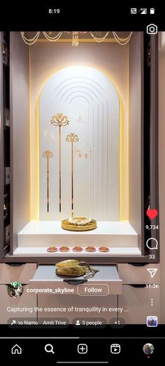 an image of a display case with flowers and candles in the center, surrounded by other items