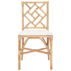 a bamboo chair with a white cushion on the back and seat, in front of a white background