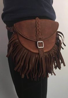 Fringed leather pouch with braided leather belt. Pouch is 6 inches deep and 9 inches wide at the top. Both pouch and belt close with 1 inch buckles. Fits 35-40 inch waist. Leather Utility Belt, Festival Belt, Banana Bag, Lighter Case, Braided Leather Belt, Utility Belt, Leather Fanny Pack, Belt Leather, Belt Pouch