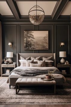 a large bed sitting under a chandelier in a bedroom