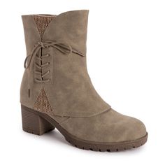 Make every step count in MUK LUKS Women's Lucy Lillith Boots. This water-resistant mid-shaft boot has a 2.28 inch stacked block heel to give you a confidence boost, and a full side zip to easily slide these on and off, and a decorative lace-up detail for a little flair. We've also given these boots our Muk Luxe lining for added warmth and comfort. Mid Shaft Boots, Muk Luks Boots, Women's Ankle Boots, Womens Ankle Boots, Dress And Heels, Stacked Heel, Brown Boots, Dress With Boots, Womens Slippers