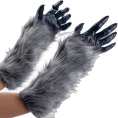 two hands in gloves with claws on each hand, one is wearing black and the other has grey fur