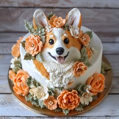 a cake decorated with flowers and a dog's face