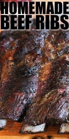 a close up of a steak on a cutting board with the words homemade beef ribs