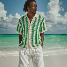 - Artisan hand-crocheted men's short-sleeve shirt with green and beige stripes offering a distinct beach vibe - Crafted with exceptional skill to provide a unique style statement piece for your wardrobe - Customizable fit to suit your body shape and size preferences, each shirt is made to order just for you - We endeavor to match the product to the image with high accuracy, ensuring you receive a creation that meets your expectations SIZES and MEASUREMENTS - The pictured item is suitable for siz Green Short Sleeve Shirt For Beach Season, Green Crochet Crew Neck Top, Green Cotton Shirt For Beach Season, Casual Crochet Short Sleeve Shirt, Crochet Short Sleeve Tops For Vacation, Short Sleeve Crochet Shirt For Summer, Cotton Crochet Short Sleeve Shirt, Short Sleeve Cotton Crochet Shirt, Summer Crochet Short Sleeve Shirt