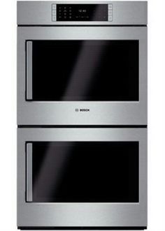 two stainless steel ovens side by side