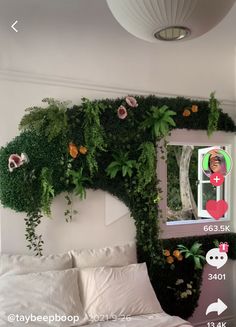 a bedroom with plants growing on the wall and a mirror in the corner above it