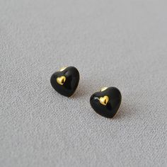 Color: Red, Black, Beige Fashion Element: Love Heart/Heart Shape Style: Elegant Elegant Black Earrings With Heart Charm, Gold Enamel Heart Earrings, Black Heart Charm Earrings As Gift, Black Heart-shaped Earrings For Gift, Trendy Black Heart-shaped Earrings, Black Heart Earrings As A Gift, Black Earrings With Heart Charm For Gift, Black Heart Earrings For Pierced Ears As Gift, Elegant Heart-shaped Enamel Earrings