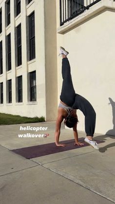 a person doing a handstand in front of a building with the caption helicpter walkover