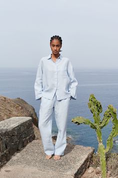 "Unwind in style and comfort with a linen pajama set. This set includes a long sleeve shirt and pants, both featuring pockets for added convenience. Made from breathable Lithuanian linen fabric, it's perfect for a cozy night's sleep or relaxed lounging at home. Enjoy the timeless elegance and practicality of this classic ensemble.  READY FOR GIFT!  ✨ Gift message available (please write the message in the comments field).   All packages are packed in our original eco-friendly white boxes made from recycled paper. DETAILS: - Pure 100% linen fabric - OEKO-TEX certified fabric - Stone washed for maximum softness - Loose and comfortable fit - High-waisted pants - Inseam side pockets - Long-sleeved shirt - River shell buttons FIT and SIZING Please check the last pictures for the size chart. The Relaxed Fit Long Sleeve Sets, Long Sleeve Linen Sleepwear For Relaxation, Linen Long Sleeve Sleepwear For Lounging, Relaxed Fit Linen Sets With Straight Pants, Linen Loungewear Set, Shirt And Wide Leg Pants, Linen Pajama Set, Linen Lounge, Stylish Loungewear