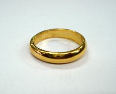 22kt gold ring from rajasthan india. Plain handmade ring made of 22kt yellow gold, good for jewelry collection. Usa ring size - 8 (we can adjust the size) Width of top - 4 mm weight - 6.5 grams Material - 22kt gold. Gold Ring Plain, Simple Gold Earrings, Handmade Gold Ring, Plain Gold Ring, Beauty Organization, Solid Gold Ring, Golden Ring, Plain Bands, Etsy Gold Ring