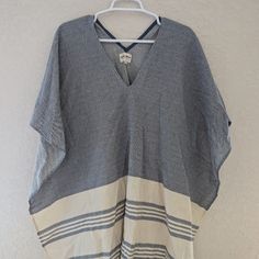 Beautiful Striped Poncho Style Coverup Or Shawl With Tassels. In Great Condition With No Defects, One Size Fits All, New Without Tags. Measurements Laying Flat: Bust: 32", Length: 34" 7.24.5 #Coastal #Nautical #Boho #Poncho #Coverup #Tassels #Beach Casual V-neck Beach Poncho, Oversized Poncho With Batwing Sleeve For Vacation, Bohemian Poncho For Loungewear In Spring, Blue Casual Kaftan For Loungewear, Blue Poncho For Spring Vacation, Blue Casual Poncho For Vacation, Blue Poncho For Vacation In Spring, White Batwing Sleeve Poncho For The Beach, Blue Oversized Kaftan For Loungewear