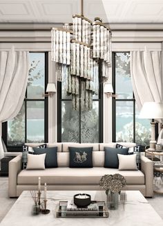 a living room filled with lots of furniture next to large windows and chandelier