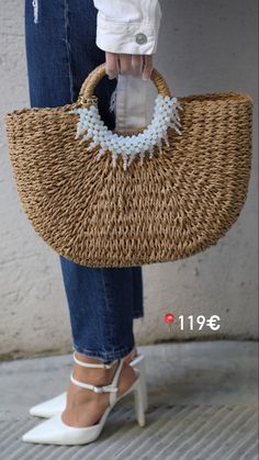 Stylish crystal-studded handbag in classic black, ideal for upscale events and special occasions. Chic Rectangular Straw Bag With Pearl Handle, Chic Summer Rattan Crochet Bag, Elegant Straw Bag With Pearl Handle, Elegant Woven Rattan Bag, Embellished Purses, Eco-friendly Rattan Shoulder Bag With Open Weave, Perfect Bag