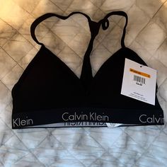 Calvin Klein Bnwt Cotton Sports Bra Black Size Small Never Worn Calvin Klein Fitted Sports Bra For Athleisure, Calvin Klein Fitted Athleisure Sports Bra, Calvin Klein Fitted Sports Bra, Calvin Klein Sporty Fitted Sports Bra, Calvin Klein Medium Support Sports Bra For Workout, Supportive Calvin Klein Activewear For Workout, Calvin Klein Black Activewear For Sports, Calvin Klein Black Activewear For Workout, Calvin Klein Black Workout Activewear