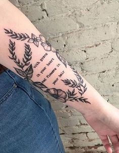 a person with a tattoo on their arm and the words, 17 typewriter - font tattoos for the girl who has a way