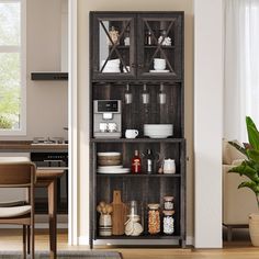 an open bookcase in the corner of a room with dishes and utensils on it