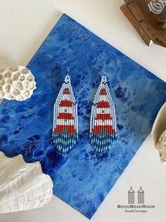 These lighthouse beaded earrings will always remind you about sea and vacation. Long fringe seed bead earrings are made from selected Czech bead. Drop Dangle beaded earrings can be cute gift for your loved ones. ♡ Bead Length - 3.7'' (9 Centimeters) ♡ Total Length - 3.9'' (10 Centimeters) ♡ Width - 1.2'' (3 Centimeters) ♡ Quality Czech beads ♡ Stainless steel mounts If you like these dangle fringe seed bead earrings but would like them in a different color or size please email me and I do a spec Colorful Beaded Round Earrings For Beach, Colorful Beaded Earrings For Beach, Colorful Round Beaded Earrings For Beach, Beach Beaded Drop Earrings With Tiny Beads, Colorful Beaded Dangle Earrings For Beach, Beach Tiny Beads Drop Earrings, Tiny Beads Drop Earrings For Beach, Tiny Beaded Drop Earrings For Beach, Colorful Beaded Earrings For The Beach