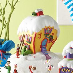 there is a cake that looks like it has been made to look like a snow globe