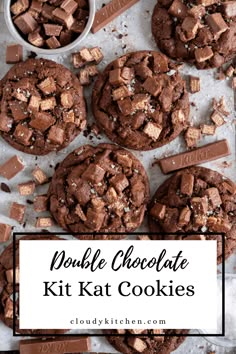 double chocolate kitkat cookies on a baking sheet with text overlay that says double chocolate kitkat cookies