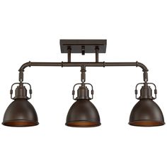 three light bronze track fixture with an industrial style finish and two shades of dark brown