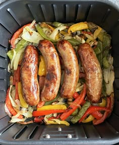 sausages and peppers in a plastic container