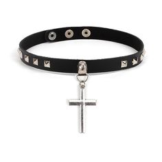 This leather cross choker necklace features a fashionably trendy motif, with the pure black leather choker lined with multiple diamond-shaped metals and a cross pendant hanging, it lets you feel the importance brought upon wearing it. Because of the simple design, it has become a recent fad for selective young enthusiastic people to wear it. Innovative Design accessories set aside cultural bias and let the world see who you really are. The pendant size is 5cm  Product Highlights:    Leather choker  Simple design lined with diamond-shaped metal  Zinc alloy material Cross Choker Necklace, Neo Gothic, Black Leather Choker, Gothic Pendant, Cross Choker, Gothic Chokers, Leather Choker Necklace, Black Choker Necklace, Womens Chokers