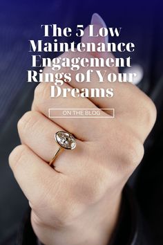 a woman's hand holding a ring with the words, the 5 low maintenance engagement rings