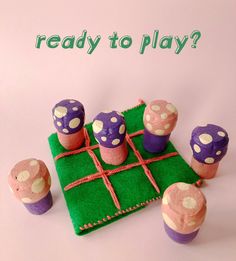 an image of a play set made out of cupcakes and grass with the words ready to play on it