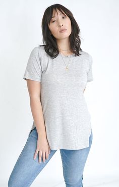 Modal Curved Hem Tee Versatile T-shirt With Shirttail Hem, Effortless Top With Shirttail Hem, Effortless Tops With Shirttail Hem, Effortless Shirttail Hem Top, Relaxed Tops With Shirttail Hem For Casual Gatherings, Relaxed Everyday Tops With Shirttail Hem, Relaxed Soft-washed Top With Shirttail Hem, Trendy Tops With Shirttail Hem For Loungewear, Basic Loungewear Tops With Shirttail Hem