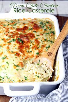 a casserole dish with chicken, rice and parsley