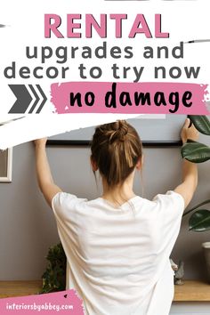 a woman holding up a sign that says rental upgrades and decor to try now no damage