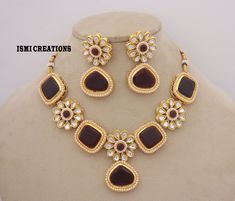 Designer Kundan, Pearls Maroon Necklace and Earrings Set Free Shipping Please contact for any query Raw material - artificial jewelry, sampen color CZ Necklace Length = 14 CM Earring Length = 6 CM Necklace weight = 54 gram Earrings weight = 13 gram care = avoid perfume, water 100% Satisfaction Guarantee: 1 Year Warranty, Long Lasting Plating, High-Quality Stones. Occasion: Perfect choice for any Indian occasion. Care: It is advisable that you keep Ismycreations products away from direct heat, hu Maroon Necklace, Rakhi Gifts For Sister, Sister Bridesmaid, Rakhi Gift, Artificial Jewelry, Stones Necklace, Earrings Indian, Gift For Sister, Cz Necklace