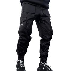 Introducing our Harajuku Cargo Techwear Pants! These pants are perfect for those who want to make a statement. The reflective fabric is eye-catching and unique, and the cargo pockets add an edgy touch. Whether you're hitting the gym or the club, these pants will keep you looking good.