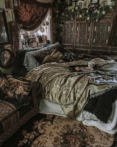 a bed sitting in the middle of a bedroom next to a dresser and window with curtains