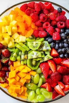 a bowl filled with different types of fruit