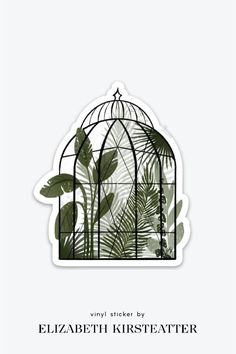 a green birdcage with leaves on it and the words elizabeth kirsteater written