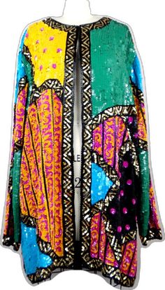 Festive Sequined Outerwear For Festivals, Festive Bohemian Sequin Outerwear, Bohemian Sequined Festive Outerwear, Bohemian Party Outerwear With Sequins, Festive Multicolor Embellished Outerwear, Vintage Multicolor Outerwear For Festive Occasions, Vintage Festive Sequin Outerwear, Vintage Sequined Outerwear For Festive Season, Vintage Sequined Outerwear For Festive Occasions