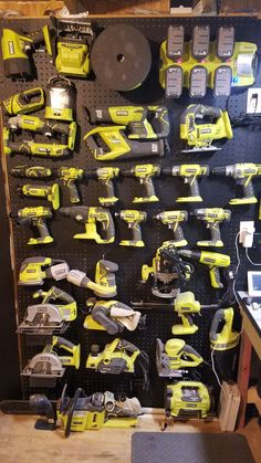 a room filled with lots of yellow and black tools