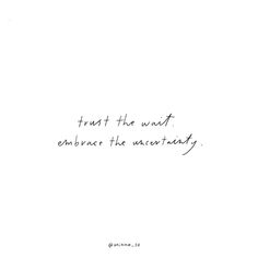 a handwritten quote on white paper that says trust the wait embrace the unconditionality